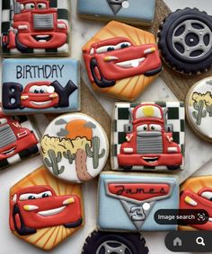 decorated cookies with cars and trucks on them