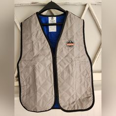 Size Medium. See Pictures For Measurements. Brand New. This Ergodyne Chill-Its 6665 Evaporative Vest In Size M Is A Must-Have For Anyone Working In Industrial Or Facility Maintenance Settings. The Vest Is Designed To Provide Maximum Protection Against Workplace Hazards While Keeping The Wearer Cool And Comfortable. Made In China, This Vest Is Of The Highest Quality And Is Built To Last. The Gray Color Of The Vest Is Perfect For Blending In With Any Work Outfit, And The Ergodyne Brand Name Ensure Evaporative Cooling, Work Gear, Vest Designs, The Gray, Stay Safe, Blue Gray, Work Outfit, Blending, Blue Grey