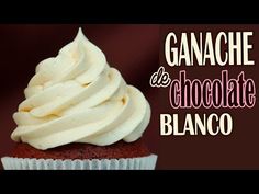 a cupcake with white frosting on top and the words ganache de chocolate