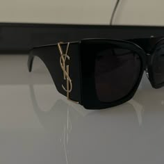 Yves Saint Laurent Sunglasses Brand New Never Worn Black With Gold Accents Black Designer Sunglasses, Yves Saint Laurent Glasses, Yves Saint Laurent Sunglasses, Ysl Aesthetic Vintage, Ysl Sunglasses Women, Yves Saint Laurent Aesthetic, Ysl Glasses, Ysl Accessories, Black And Gold Accessories