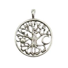 a silver pendant with an image of a tree and moon in the center on a white background