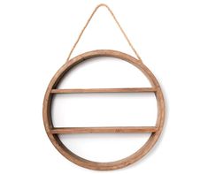 a circular wooden shelf hanging from a rope