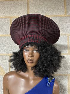 Zulu basket hat made of yarn and straw. South African headpiece Measure the circumference of your head for an exact fit This hat is squished on one side but it is wearable African Headpiece, Zulu Hat, Basket Hat, Ear Climbers, Zulu, Hat Making, Brunei, South African, Red And Black