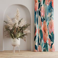 a potted plant sitting on top of a wooden floor next to a window curtain