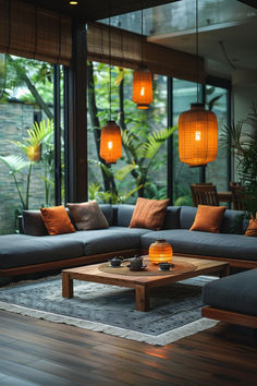 40 Biophilic Interior Designs to Boost Your Home's Appeal Gray Sectional Sofas, Modern Tropical Interior, Biophilic Interior, Lantern Lighting, Succulent Landscape Design, Gray Sectional, Orange Cushions, Biophilic Design, Beautiful Rooms