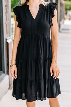 Chic Tiered Dress For Date Night, Black Casual Tiered Dress With Ruffles, Chic Black Tiered Dress With Ruffles, Black Ruffled Dress For Summer, Black Summer Dress With Ruffles, Casual Black Tiered Summer Dress, Casual Black Summer Tiered Dress, Date Night Tiered Mini Dress With Ruffle Hem, Black Tiered Skirt Dress For Day Out