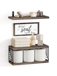 two shelves with towels, soap and other items on them