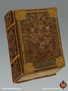 an old book with intricate designs on the front and back cover is shown in gold