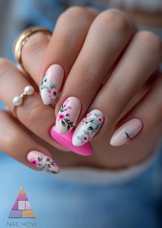 Spring Whispers: Soft pink meets the tranquility of cool blues and florals in these rounded nails, offering a whisper of spring's serene palette. Let your nails reflect the season's peaceful beauty. Whisper into spring with more nail art at nailhow.com. Rounded Nails, Round Nails