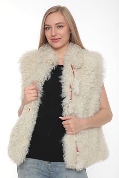 This is unique natural shearling waistcoat.  Length is 25 inches.  Size is S ( US 4 ), S ( US 6 ). Made with Mongolian shearling.  İnterior lining is sateen fabric.  There is closure button.  There is two pocket on it.  On interior lining there is little pen mark. I showed on photos.  Very chic and soft.  We have door to door express shipping.  İf you have any questions please feel free to aske.  bemyboots.etsy.com Thank You Boho Style Boots, Vintage Waistcoat, Embroidery Boots, Fur Waistcoat, Short Heel Boots, Mother Days, Handmade Vest, Boho Mode, Lamb Leather Jacket