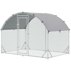 a large white chicken coop with a gray cover on the top and bottom half, in front of a white background