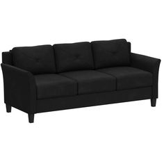 a black couch sitting on top of a white floor