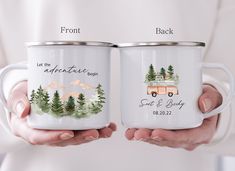 two white mugs with trees and camper on them