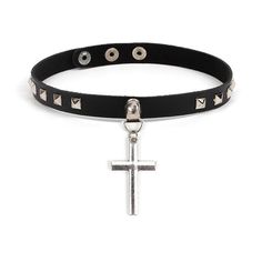 This leather cross choker necklace features a fashionably trendy motif, with the pure black leather choker lined with multiple diamond-shaped metals and a cross pendant hanging, it lets you feel the importance brought upon wearing it. Because of the simple design, it has become a recent fad for selective young enthusiastic people to wear it. Innovative Design accessories set aside cultural bias and let the world see who you really are. The pendant size is 5cm  Product Highlights:    Leather choker  Simple design lined with diamond-shaped metal  Zinc alloy material Cross Choker Necklace, Neo Gothic, Black Leather Choker, Gothic Pendant, Cross Choker, Gothic Chokers, Leather Choker Necklace, Choker Collar Necklace, Black Choker Necklace