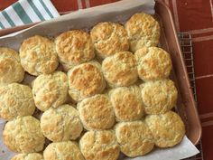 a pan filled with biscuits sitting on top of a table