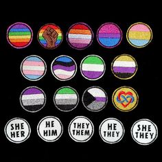 six different colored badges with the words she them