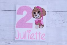 a pink and white dog birthday shirt with the number two on it's chest