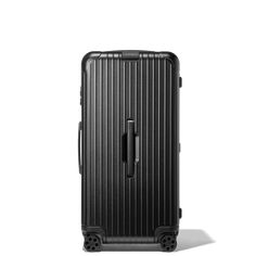 Designed with a distinctive shape inspired by our original trunks, the RIMOWA Essential Trunk Plus in matte black is built to offer travelers optimum capacity. A timeless classic luxuriously engineered with long-lasting performance in mind, this design icon is the unmistakable mark of a seasoned traveler. Oversized, yet still ultra-lightweight, this 4 wheel extra large suitcase is the ideal extra spacious check-in hard shell luggage for journeys of 2 weeks or more. Includes a complimentary leath Extra Large Suitcase, Olympic Airlines, Trunk Suitcase, Rimowa Essential, Rimowa Luggage, Cebu Pacific, Asiana Airlines, Black Trunk, China Airlines