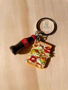 a piece of pizza and a bottle on a table