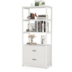 a white bookcase with two drawers and some books