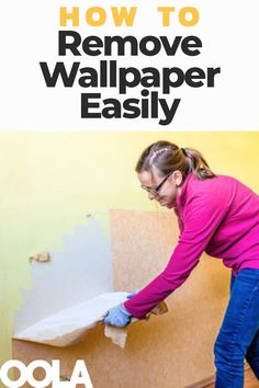 a woman in pink shirt and blue jeans painting wall with text overlay that reads how to remove wallpaper easily