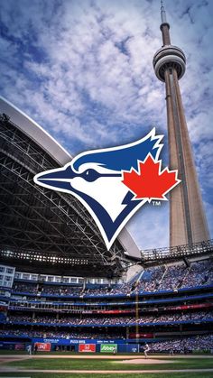 the toronto blue jackets logo is displayed in front of the sky at an outdoor baseball stadium