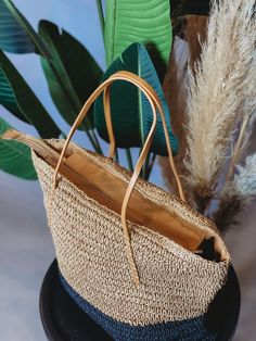 This stylish and sustainable Boho Living Straw Tote Bag is perfect for all your beach day needs! Made from natural jute, this tote is sure to turn heads with its neutral hues. No more lugging around your beach gear - pack it up in this tote bag for a fashionable way to hit the waves! Casual Beige Beach Tote Bag, Casual Beige Tote Beach Bag, Beachy Sand-colored Straw Bag, Beige Lightweight Straw Bag For Beach, Lightweight Beige Straw Bag For Beach, Lightweight Beige Straw Bag For Travel, Beige Summer Beach Bag For Daily Use, Summer Beige Bucket Bag For Daily Use, Lightweight Beige Straw Bag For Beach Season