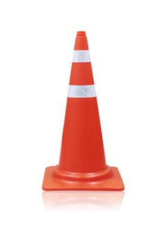 an orange traffic cone sitting on top of a white surface