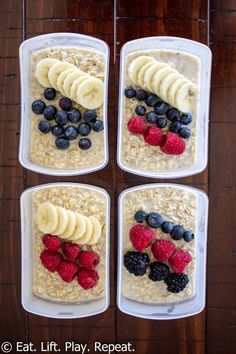 four plastic containers filled with oatmeal and fruit on top of a wooden table