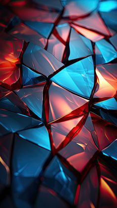 an abstract background consisting of red, blue and black glass pieces with reflections on them