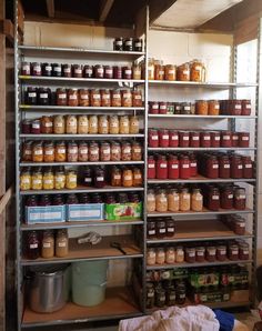 shelves filled with lots of jars and containers