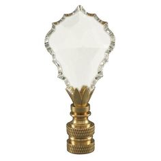 an antique brass and crystal glass table lamp on a white background with clippings