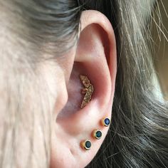 a person with ear piercings on their ears