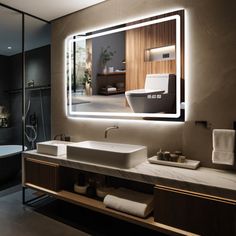 a bathroom with a sink, mirror and bathtub in the middle is lit up