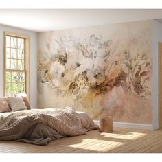 a bedroom with a large painting on the wall