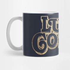 a black and gold coffee mug with the number 66 on it