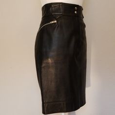 Genuine Alaia Leather Skirt. Fr Size 40. Skirt In Excellent Pre-Owned Condition. One Tiny Flaw Is A Small Superficial Scratch Near The Bottom Of The Skirt On The Backside. It Is Not Noticeable, Please See Photo #5. The Skirt Is Fully Lined. The Back Seam Of The Inside Lining Has Started To Come Undone (See Photo #7), This Could Be Easily Fixed, Its Not Noticeable And Does Not Affect The Function Of The Skirt. Otherwise Skirt Is In Great Condition. Retails For $9,120. Luxury Fitted Skirt With Belt Loops, Luxury Black Office Skirt, Classic Knee-length Leather Skirt, Elegant Leather Skirt With Belt Loops, Classic Black Skirt With Belt Loops, Formal Leather Skirt With Belt Loops, Knee-length Leather Bottoms For Formal Occasions, Formal Knee-length Leather Skirt, Luxury Fitted Leather Skirt