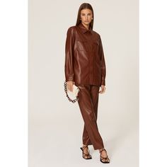 Brown faux leather (65% Polyester, 35% Polyurethane). Top. Collared neckline. Long sleeves. Front button closure. 28" from shoulder to hemline. Imported. Faux Leather Shirt, Rent The Runway, Leather Shirt, Closet Designs, Anine Bing, Cut Shirts, Duster Coat, Faux Leather, Long Sleeves