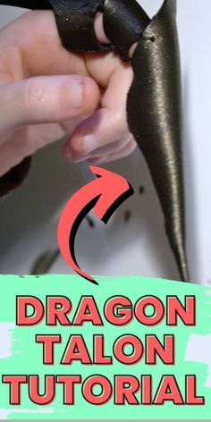 the dragon talon is being held up by someone's hand with an arrow pointing to it