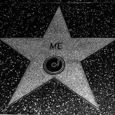 a star on the hollywood walk of fame with music note in it's center