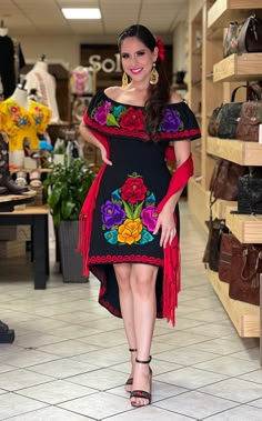 This Beautiful Mexican Sunflower Dress is the perfect dress for a special event or Mexican Fiesta. It reflects the Mexican culture through its unique design and vibrant colors. It has elastic on the back for an adjustable fit and is embroidered by Artisanal Machine by Mexican Artisans in Guanajuato, Mexico. It's made out of fresh Mexican cotton, is full of embroidered multicolor flowers. This is A-line dress. Size S - 2X Available in White/Red, Beige/Red & Black/Red here: https://www.etsy.com/es Asymmetrical Hem Dress For Festival, Bohemian Dress For Fiesta Party, Bohemian Fiesta Party Dress, Bohemian Party Dress For Fiesta, Mexican Outfits For Women, Mexican Theme Dresses, Dress Latina, Mexican Party Dress, Mexican Fancy Dress