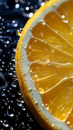 an orange slice with water droplets on it