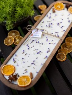 dried orange slices and lavender on a tray