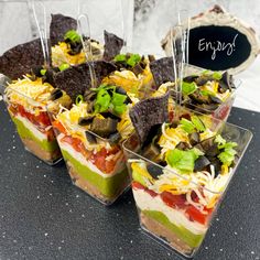 seven layer dip cups with tortilla chips