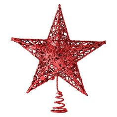 a red christmas ornament hanging from a string on a star shaped tree top