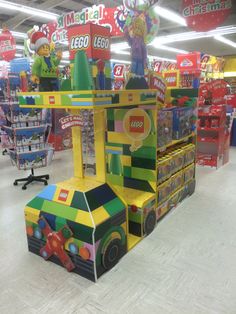 an inflatable toy store display with legos and toys on the shelves for sale