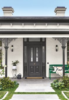 an instagram page with a black door and green bench in front of it on the phone