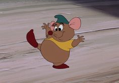 a cartoon mouse is standing on one leg and holding his hand out to the side