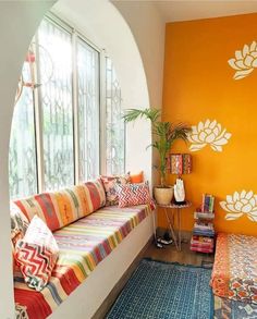 a living room filled with lots of colorful furniture