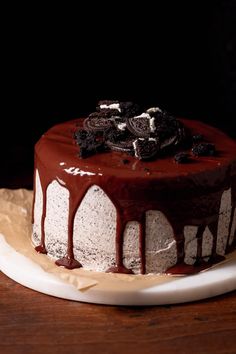 a chocolate cake with oreo cookies on top